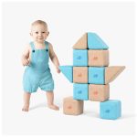 toddler playing big soft magnetic blocks