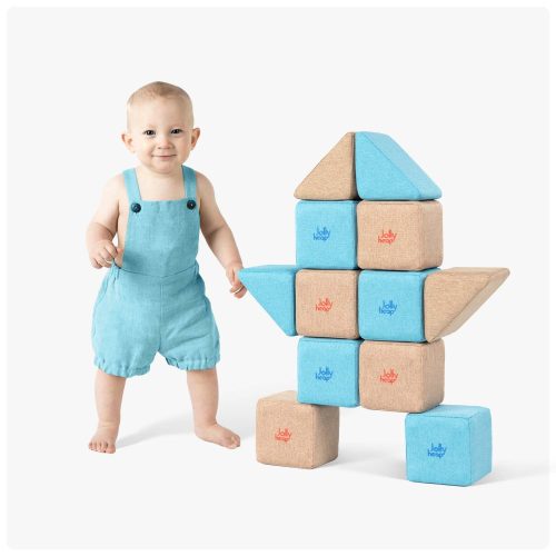 toddler playing big soft magnetic blocks